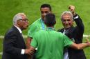 Algeria's Bosnian coach Vahid Halilhodzic (R) celebrates his team's victory during a Group H football match between South Korea and Algeria at the Beira-Rio Stadium in Porto Alegre during the 2014 FIFA World Cup on June 22, 2014