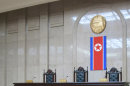 In this March 20, 2013 photo, a North Korean flag hangs inside the interior of Pyongyang's Supreme Court. North Korea says it will soon deliver a verdict in the case of detained American Kenneth Bae it accuses of trying to overthrow the government, further complicating already fraught relations between Pyongyang and Washington. The announcement about Bae comes in the middle of a lull after weeks of war threats and other provocative acts by North Korea against the U.S. and South Korea. Bae, identified in North Korean state media by his Korean name, Pae Jun Ho, is a tour operator of Korean descent who was arrested after arriving with a tour on Nov. 3 in Rason, a special economic zone bordering China and Russia. (AP Photo)