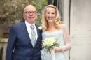 Musicians and media figures celebrate Murdoch-Hall wedding