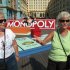In this Sept. 13, 2011 photo, France Duff, left, of Wellham, Canada, and Shirley Theal, right, of Niagara Falls, Canada, stand in front of a life-sized Monopoly board that caught their attention on the Atlantic City Boardwalk in Atlantic City, N.J. Atlantic City once had a monopoly on casino gambling on the East Coast, but will have to fight in 2012 as never before against competition from casinos all around it. (AP Photo/Wayne Parry)