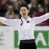Denis Ten, from Kazakhstan, celebrates after his free skate program in the men's competition at the World Figure Skating Championships Friday, March 15, 2013 in London, Ontario. Ten won the silver medal. (AP Photo/The Canadian Press, Paul Chiasson)
