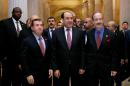 Iraqi Prime Minister Nouri al-Maliki, center, walks with the House Foreign Affairs Committee ranking Democrat Rep. Eliot Engel, D-N.Y., right, and the committee's chairman Rep. Ed Royce, R-Calif. in Washington, Wednesday, Oct. 30, 2013, before their meeting. Al-Maliki says terrorists 