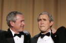 FILE - In this April 29, 2006 file photo, President Bush, left, and Steve Bridges, a comedian and President Bush look alike, gestures during the White House Correspondents' Association's 92nd annual awards dinner in Washington. Bridges, best known for impersonating former President George W. Bush, has died at home in Los Angeles. (AP Photo/Haraz N. Ghanbari, File)