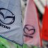 Logos of Mazda Motor Corp are seen at a dealership in Tokyo