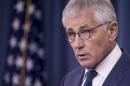 Outgoing Defense Secretary Chuck Hagel speaks during a news conference at the Pentagon, Thursday, Jan. 22, 2015. (AP Photo/Cliff Owen)