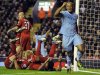 Manchester City's Kompany celebrates scoring against Liverpool during their English Premier League soccer match in Liverpool
