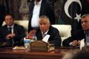 Libya's Prime Minister Ali Zeidan addresses a news conference after his release in Tripoli