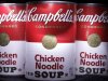 This Feb. 15, 2012 photo shows cans of Campbell's Chicken Noodle Soup, posed in San Diego. Campbell Soup Co. said Friday Feb. 17, its second-quarter net income fell 14 percent as it faced higher commodity costs and it worked to improve its core soup business. (AP Photo/Gregory Bull)