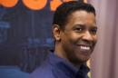 Denzel Washington appears at a press opportunity for the upcoming Broadway production of "A Raisin in the Sun" on Tuesday, Feb. 18, 2014 in New York. (Photo by Charles Sykes/Invision/AP)