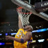 Los Angeles Lakers guard Kobe Bryant lays the ball in over Portland Trail Blazers center Kurt Thomas during the first half on an NBA basketball game, Monday, Feb. 20, 2012, in Los Angeles. (AP Photo/Bret Hartman)