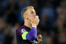 Manchester City goalkeeper Joe Hart salutes the fans after the Champions League Play-off, Second Leg match against Steaua Bucharest at the Etihad Stadium, Manchester, England, Wednesday Aug. 24, 2016. (Nigel French / PA via AP)