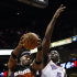 Phoenix Suns' Jermaine O'Neal (20) grabs a rebound in front of Oklahoma City Thunder's Kendrick Perkins (5) during the first half in an NBA basketball game Sunday, Feb. 10, 2013, in Phoenix.(AP Photo/Ross D. Franklin)