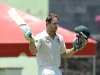 Australian batsman Matthew Wade celebrates after it took him 143 balls to hit a maiden Test century