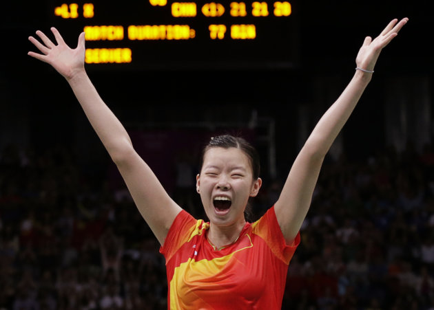 China&#39;s Li Xuerui celebrates winning her women&#39;s singles badminton gold medal match against compatriot Wang Yihan at the London 2012 Olympic Games at the Wembley Arena