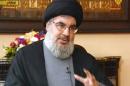 An image grab taken from Hezbollah's al-Manar TV on December 3, 2013 shows Hassan Nasrallah, chief of Lebanon's Shiite Hezbollah movement, giving an interview to local television station OTV at an undisclosed location in Lebanon