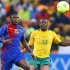 Cape Verde's Soares challenges South Africa's Dikgacoi during the opening match of the Africa Cup of Nations (AFCON 2013) soccer tournament in Soweto