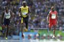 Jamaica's Usain Bolt, center, Trinidad and Tobago's Richard Thompson, right, and Britain's James Dasaolu compete in a men's 100-meter heat during the athletics competitions of the 2016 Summer Olympics at the Olympic stadium in Rio de Janeiro, Brazil, Saturday, Aug. 13, 2016. (AP Photo/David J. Phillip)