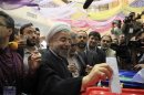 Presidential candidate Hassan Rohani casts his ballot during the Iranian presidential election in Tehran