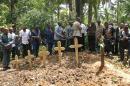 A burial ceremony for victims of an attack by suspected Ugandan Islamist rebels from the Allied Democratic Forces near Beni on April 16, 2015