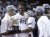 Miami Heat's Ray Allen, left, holds the NBA Eastern Conference trophy as Chris Bosh hold his son Jackson and  Dwyane Wade and LeBron James smile, Monday, June 3, 2013, in Miami. The Heat defeated the Indiana Pacers 99-76 to advance to the NBA Finals against the San Antonio Spurs. (AP Photo/Lynne Sladky)