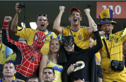 Ukraine soccer fans cheer before their Group D Euro 2012 soccer match against England at the Donbass Arena in Donetsk