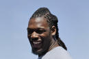 South Carolina's Jadeveon Clowney smiles during an NFL football event in New York, Wednesday, May 7, 2014. The event was to promote Play 60, an NFL program which encourages kids to be active for a healthy life. (AP Photo/Seth Wenig)