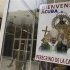 Man walks by poster of Pope Benedict XVI in Havana