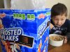 FILE - Nathaniel Donaker, 4, eats Kellogg's Frosted Flakes cereal at his home in Palo Alto, Calif., Thursday, April 28, 2011. Tony the Tiger and Toucan Sam can rest easy. Government officials fine-tuning guidelines for marketing food to children say they won't push the food industry to get rid of colorful cartoon characters on cereal boxes anytime soon. The food industry, backed by House Republicans, who are holding a hearing on the issue Wednesday, Oct. 12, 2011 has aggressively lobbied against the voluntary guidelines, saying they are too broad and would limit marketing of almost all of the nation's favorite foods, including some yogurts and many children's cereals.   (AP Photo/Paul Sakuma)