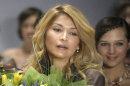 FILE - In this Saturday, April 2, 2011 file photo, Gulnara Karimova seen just after a display of creations of 'Guli' collections at the Fashion Week in Moscow, Russia. Karimova, the glamorous daughter of Uzbekistan's authoritarian president, said on Twitter on Friday, April 6, 2012, that she's releasing a new music album. (AP Photo/Mikhail Metzel, file)