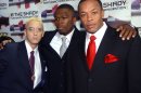FILE - Rappers Eminem, left, 50 Cent, center, and Dr. Dre pose for photographers after arriving at the Roseland Ballroom for a concert 