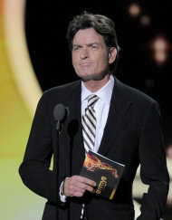 Charlie Sheen presents the award for outstanding lead actor in a comedy series at the 63rd Primetime Emmy Awards on Sunday, Sept. 18, 2011 in Los Angeles. (AP Photo/Mark J. Terrill)