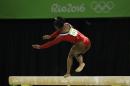 United States' Simone Biles stumbles during her performance on the balance beam during the artistic gymnastics women's apparatus final at the 2016 Summer Olympics in Rio de Janeiro, Brazil, Monday, Aug. 15, 2016. (AP Photo/Dmitri Lovetsky)