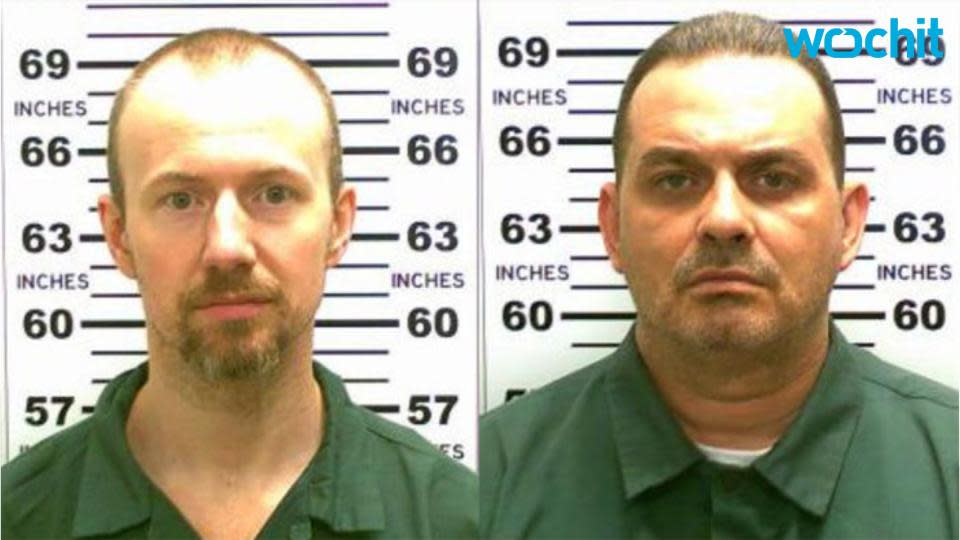 Police converge on NY town where escaped prisoners said sighted.