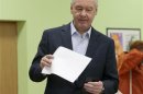 Current Moscow mayor Sergei Sobyanin casts his vote at a polling station in Moscow