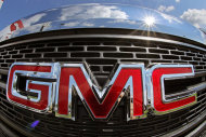 <p> This Tuesday, July 23, 2013, photo, shows a grill of a 2013 GMC Terrain AWD SLT-1 in Pittsburgh. General Motors reports quarterly earnings on Thursday, July 25, 2013. (AP Photo/Gene J. Puskar)