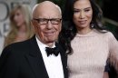 FILE- In this Sunday, Jan. 15, 2012, file photo, Rupert Murdoch and his wife Wendi arrive at the 69th Annual Golden Globe Awards in Los Angeles. Murdoch filed Thursday, June 13, 2013, for divorce from Wendi Deng Murdoch, his wife since 1999.(AP Photo/Matt Sayles, File)