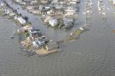 This image provided by the U.S. Coast Guard shows storm damage from Superstorm Sandy in a portion of New Haven Conn. taken during an overflight with Coast Guard Air Station Cape Cod, Mass, following Hurricane Sandy Wednesday Oct. 30, 2012. (AP Photo/US Coast Guard, Petty Officer 2nd Class Rob Simpson)