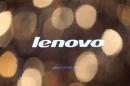 The logo of Lenovo is seen on a computer monitor during a news conference in Hong Kong