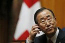 UN Secretary-General Ban Ki-moon listens to speech in the Swiss National Council during his visit in the Autumn Parliament Session in Bern