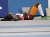 Cuba's Yargeris Savigne lies on the track in the final of the Women's Triple Jump at the World Athletics Championships in Daegu, South Korea, Thursday, Sept. 1, 2011. (AP Photo/David J. Phillip)