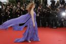 Actress Jessica Chastain poses for photographers as she arrives for the screening of Foxcatcher at the 67th international film festival, Cannes, southern France, Monday, May 19, 2014. (AP Photo/Thibault Camus)