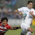 France's Dimitri Yachvili, right, runs past Japan's Takashi Kikutani during their Rugby World Cup game at North Harbour Stadium in Auckland, New Zealand, Saturday, Sept. 10, 2011.  (AP Photo/Christophe Ena)