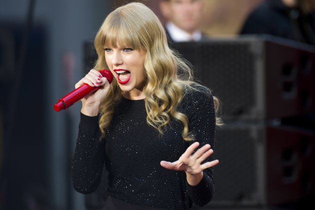FILE - This Oct. 23, 2012 file photo shows Taylor Swift performing on ABC's "Good Morning America" in New York. Swift will co-host The Grammy nominations concert with LL COOL J on Wednesday, Dec. 5, in Nashville, Tenn. (Photo by Charles Sykes/Invision/AP, file)