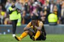 Hull City's Abel Hernandez reacts after his team are relegated from the English Premier League soccer after their match against Manchester United at the KC Stadium, Hull, England, Sunday May 24, 2015. (AP Photo/Jon Super)