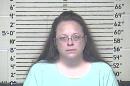 This Thursday, Aug. 3, 2015 photo made available by the Carter County Detention Center shows Kim Davis. The Rowan County, Ky. clerk went to jail Thursday for refusing to issue marriage licenses to gay couples, but five of her deputies agreed to comply with the law, ending a two-month standoff. (Carter County Detention Center via AP)