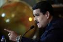 A picture released by the Venezuelan Presidency shows President Nicolas Maduro speaking during a meeting with his cabinet at the presidential palace in Caracas, March 9, 2015