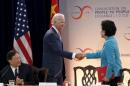 US Vice President Joe Biden shakes hands with Chinese Vice Premier Liu in Washington