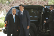 Israel's President Shimon Peres, left, and US Republican presidential candidate Mitt Romney walk during a meeting at the President's residence in Jerusalem, Sunday, July 29, 2012. Romney would back an Israeli military strike against Iran aimed at preventing Tehran from obtaining nuclear capability, a top foreign policy adviser said early Sunday, outlining the aggressive posture the Republican presidential candidate will take toward Iran in a speech in Israel later in the day. (AP Photo/Sebastian Scheiner)