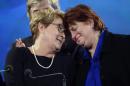 Parti Quebecois leader Pauline Marois is hugged by Nicole Leger after taking the stage following the PQ defeat in the provincial election Monday April 7, 2014 in Montreal. Marois also lost her seat in Charlevoix-Cote-de-Beaupre to Liberal candidate Caroline Simard. (AP Photo/The Canadian Press, Paul Chiasson)