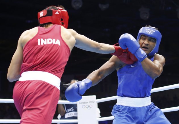 India's Sangwan fights against Brazil's Falcao Florentino in the men's Light Heavy (81kg) Round of 32 boxing match during the London 2012 Olympic Games